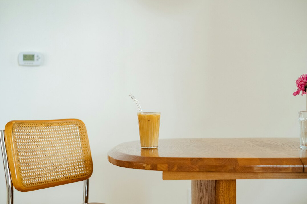 Calculator, pen and receipts on a table