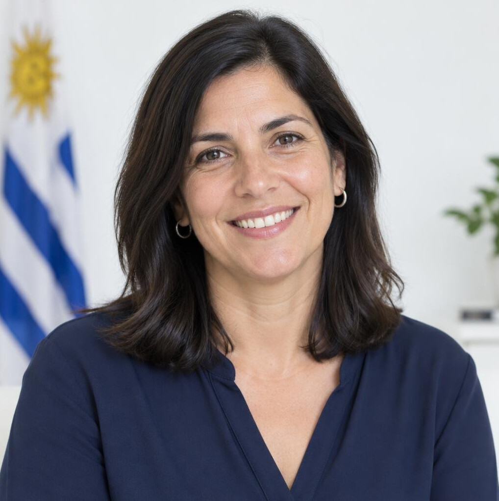 Portrait of a smiling woman in her forties with dark hair