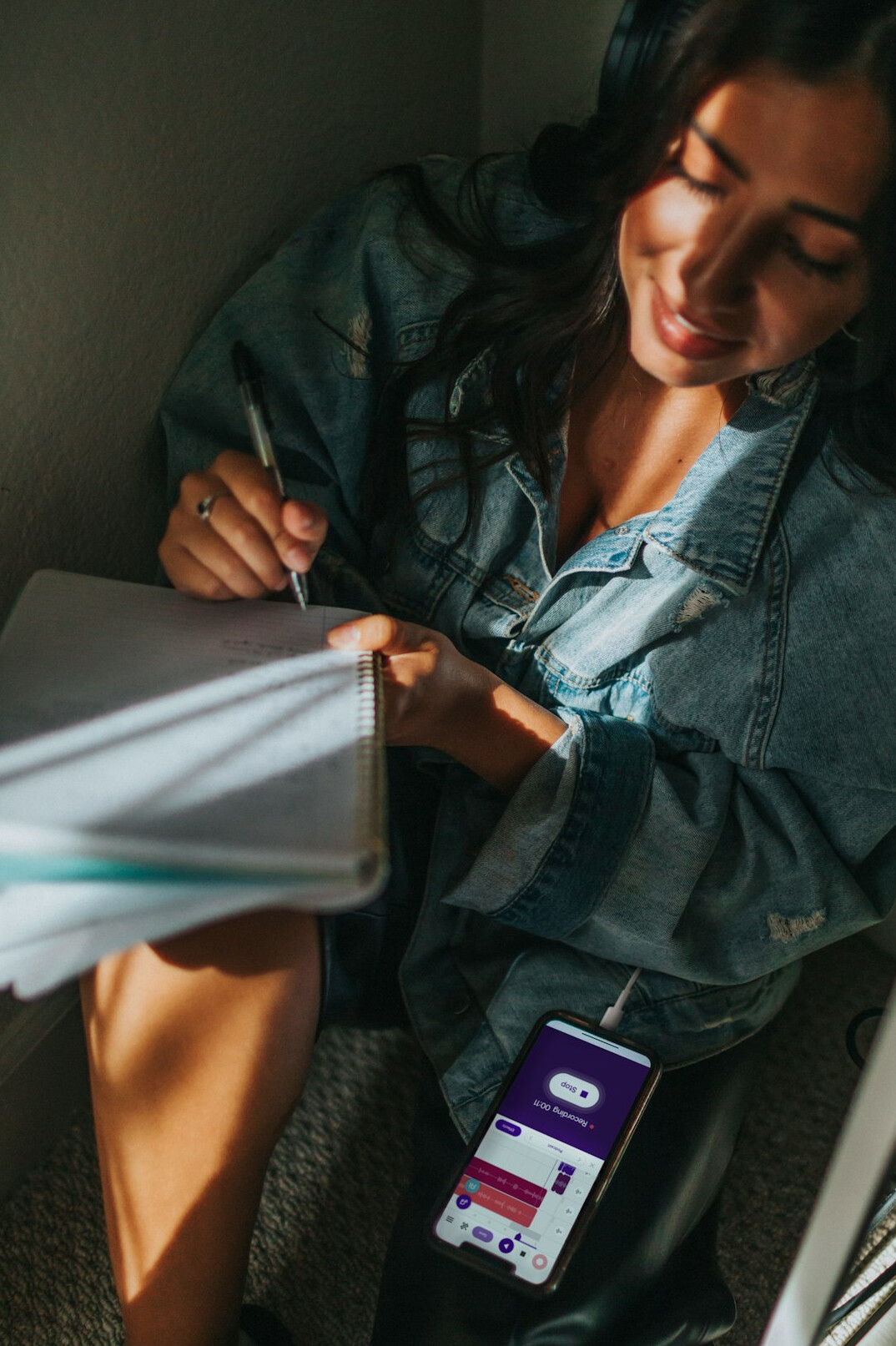 woman tracking expenses on phone