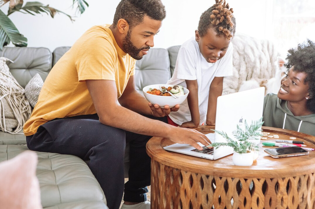 family reviewing monthly expenses